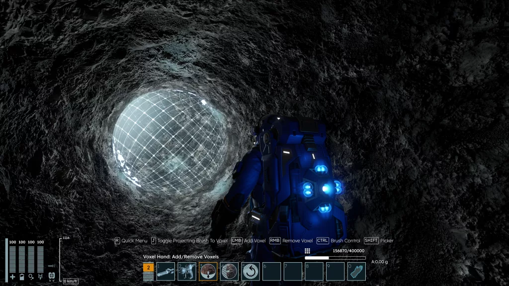 A player in a blue spacesuit uses a voxel hand tool to create a spherical structure of glowing blue lines within a dark cave on an asteroid in Space Engineers 2.