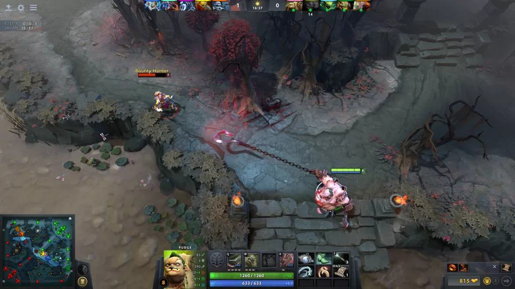 A screenshot from Dota 2 showing Pudge, a Strength hero, using his signature hook to pull an enemy Bounty Hunter towards him.