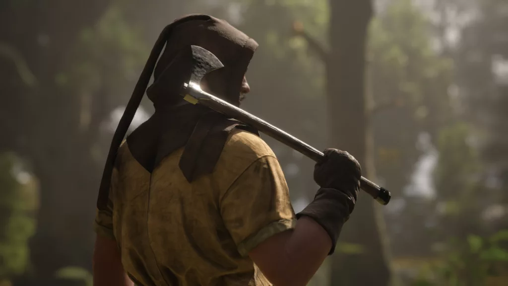 A rugged character wearing a hood and simple medieval attire rests an axe on their shoulder while standing in a misty forest in Pax Dei. The soft lighting and detailed textures enhance the immersive atmosphere.
