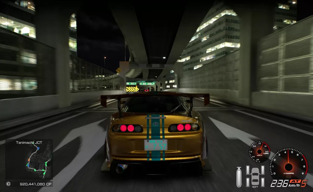 A high-speed highway race in Tokyo Xtreme Racer, featuring a golden Toyota Supra with a blue racing stripe speeding through a neon-lit expressway at night.