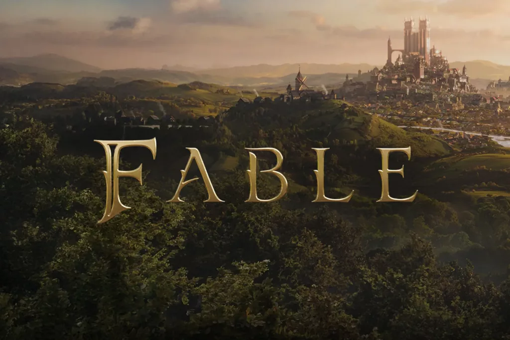 A scenic landscape with a distant castle and the title “Fable” overlaid in golden letters.