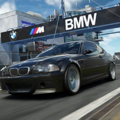 A realistic screenshot from the sim racing game Assetto Corsa EVO showing a black BMW M3 E46 CSL speeding down a race track, with a large BMW banner visible above the track.