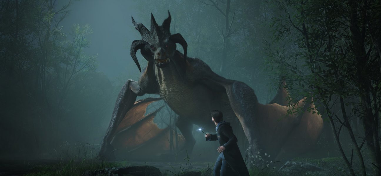 A dramatic screenshot from Hogwarts Legacy showing a student wizard standing bravely in a misty forest, aiming his wand at a large, fierce-looking dragon with prominent horns and leathery wings.
