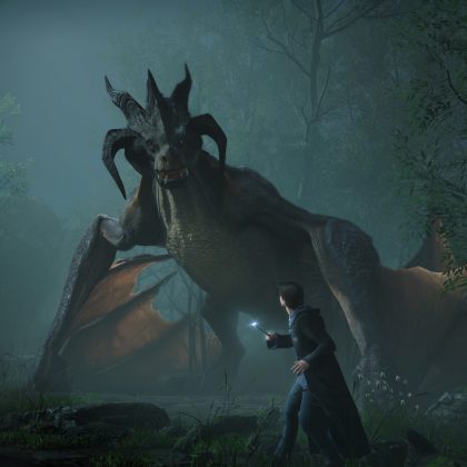 A dramatic screenshot from Hogwarts Legacy showing a student wizard standing bravely in a misty forest, aiming his wand at a large, fierce-looking dragon with prominent horns and leathery wings.