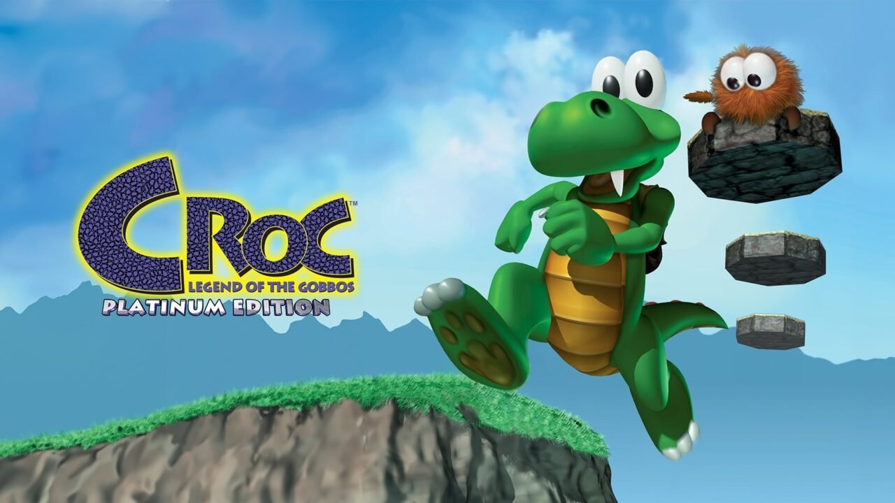 Croc Legend of the Gobbos Platinum Edition key art: Croc leaping across floating stone platforms beside a furry Gobbo under a blue sky, with the Croc logo on the left