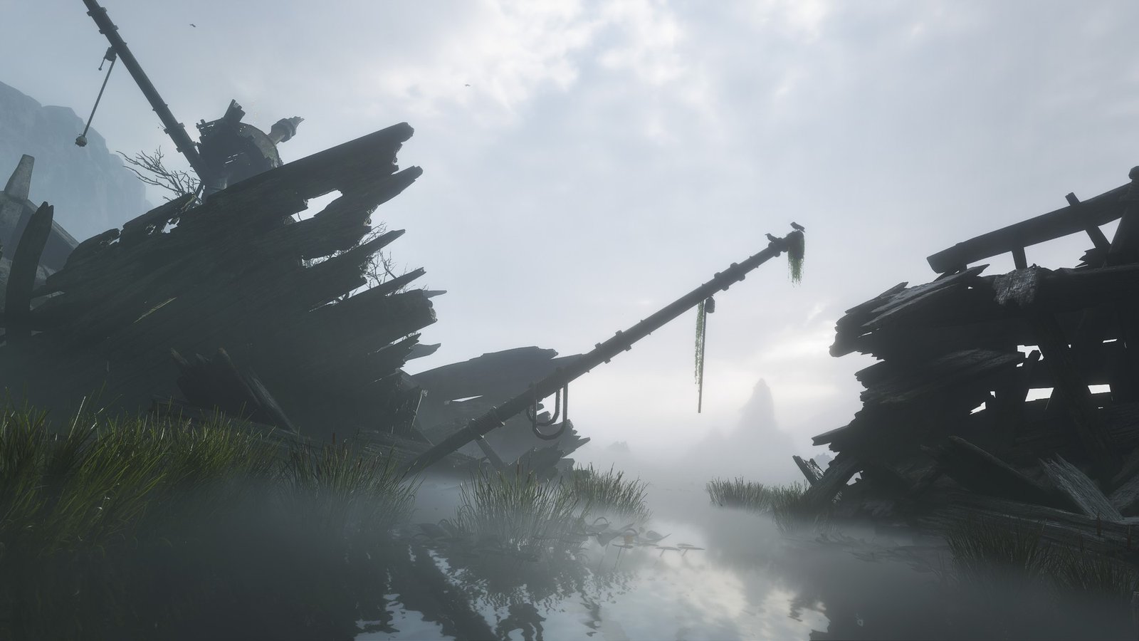 Fable: Wraithmarsh shipwreck Fable screenshot: the broken wooden hulls of wrecked ships sit in still, misty marsh water in Wraithmarsh