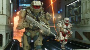 Halo Infinite screenshot: Two Spartans charging down a corridor with an explosion behind them