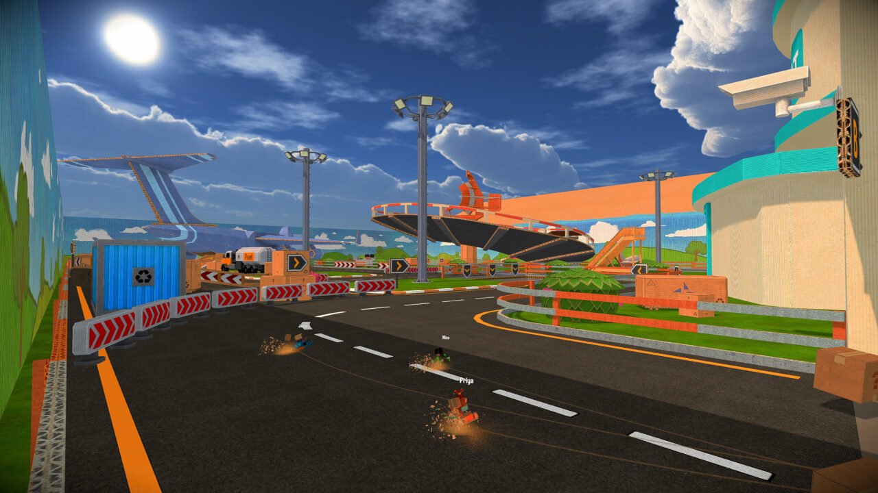 Cardboard karts racing on an airport-themed track in KartBoard Dash