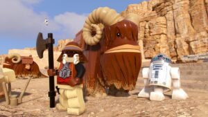 LEGO Star Wars: The Skywalker Saga screenshot: LEGO characters on a desert planet beside a bantha and R2-D2