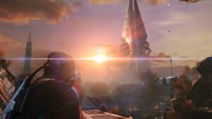 Mass Effect Legendary Edition screenshot: Shepard looking out at a tall spire under a setting sun