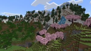 Minecraft screenshot: A cherry blossom grove on a hillside beside snowy mountains