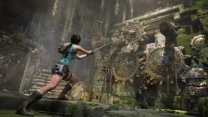 Lara Croft approaching a large ancient mechanism of cogs in an overgrown ruin