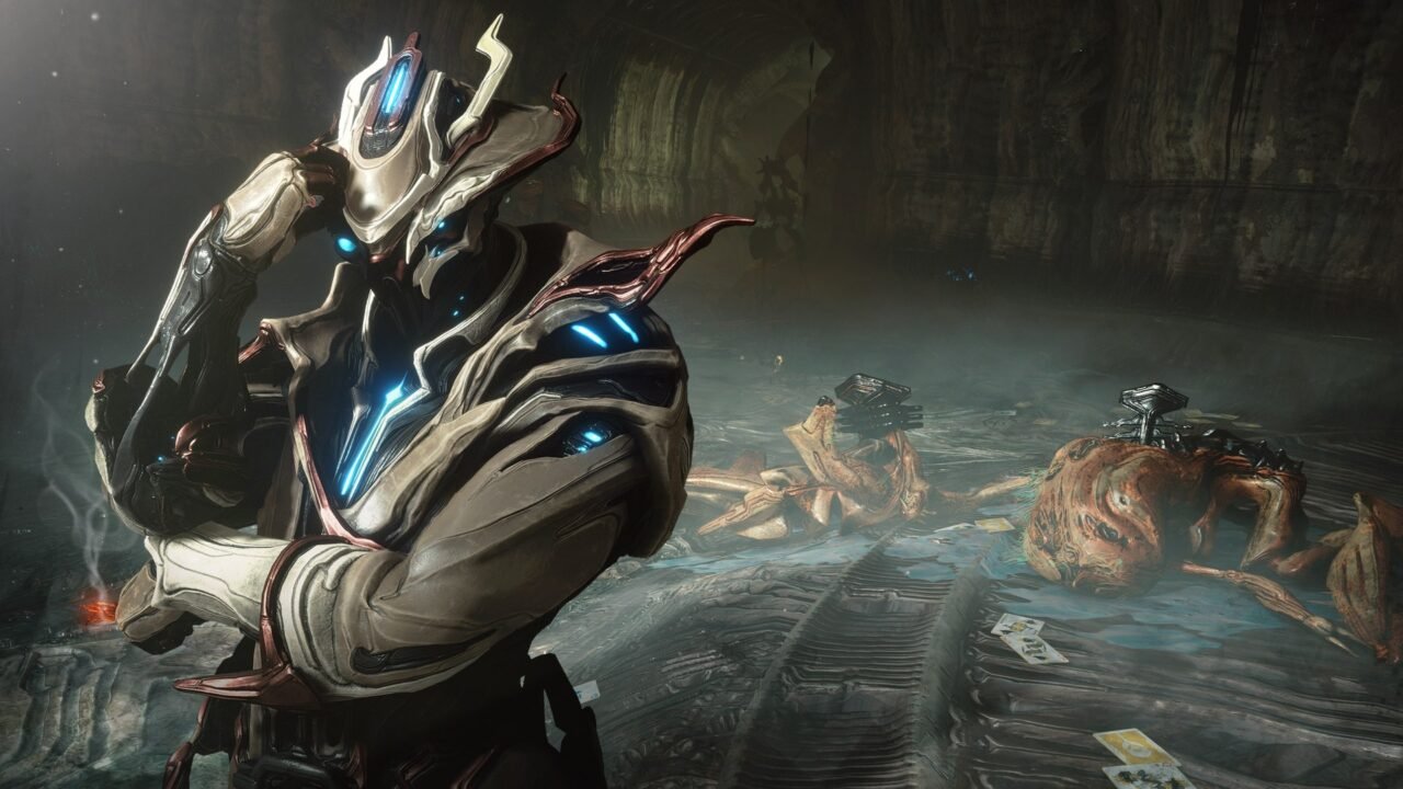 Warframe: Tau screenshot: Brysko, a Warframe in a fedora-style crest and trench coat, tips his hat beside defeated enemies and scattered playing cards.